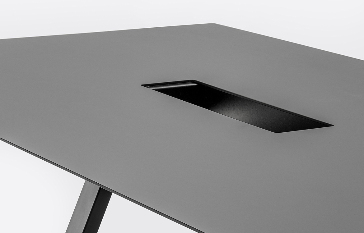 Black commercial table with cable hatch