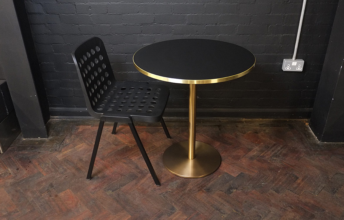 Brass cafe table black top