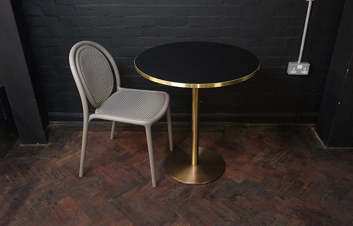 Brass cafe table black top