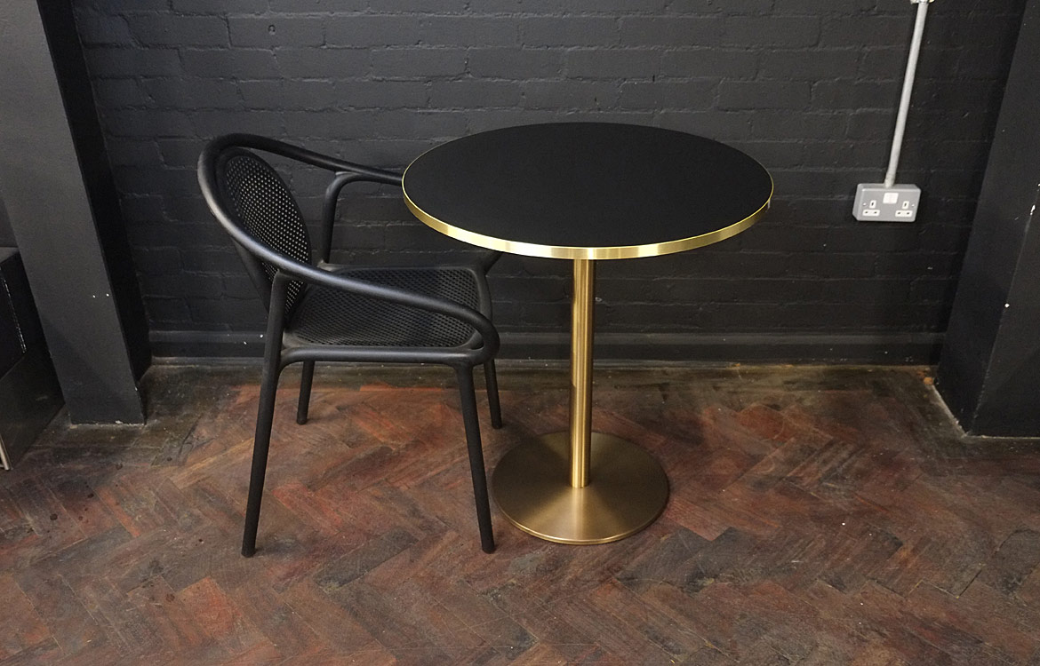 Brass cafe table black top
