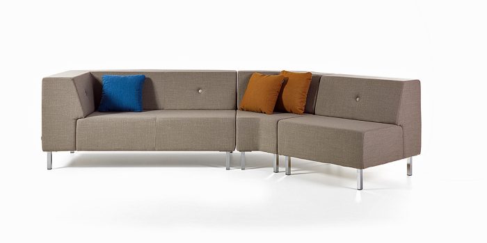Commercial modular angled sofa in light brown fabric