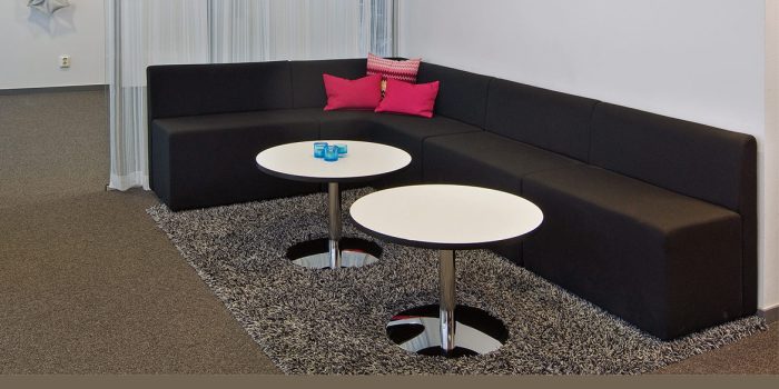 Dark grey L-shaped reception seating