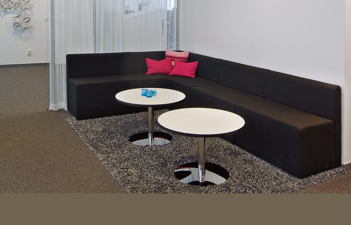 Dark grey L-shaped reception seating