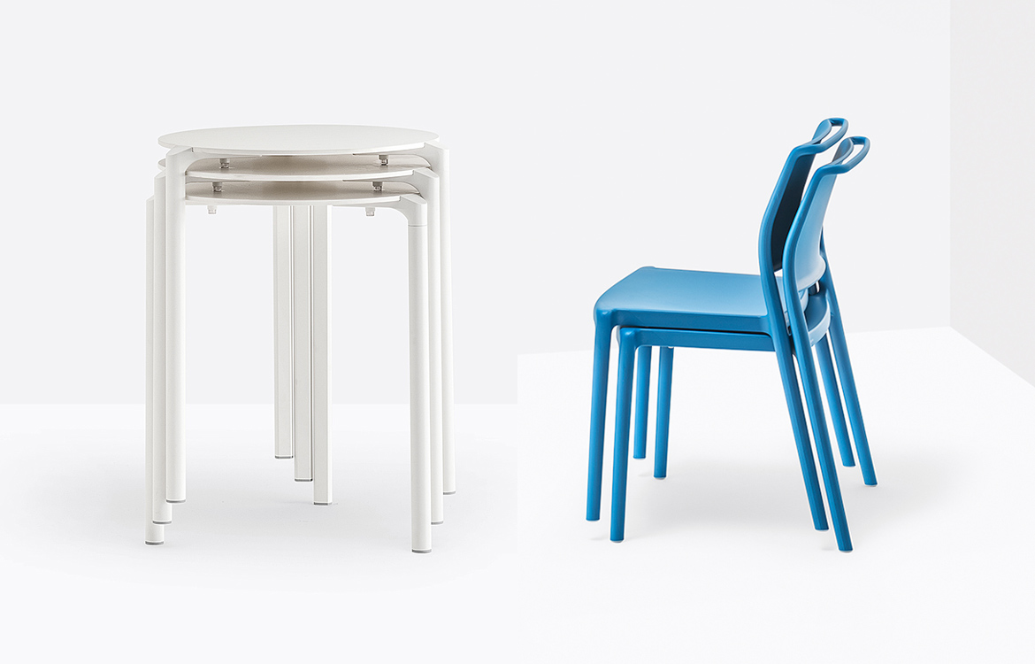 Small round stacking cafe table with blue cafe chair