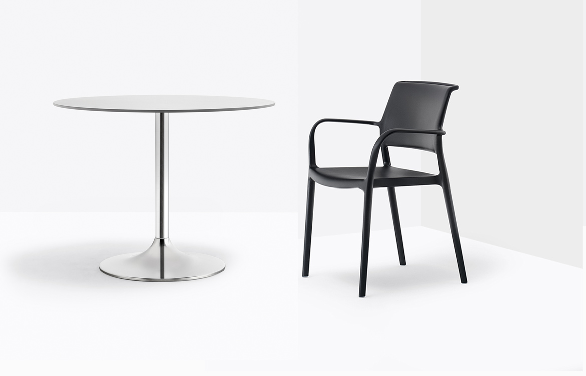 Large Trumpet table with black chair