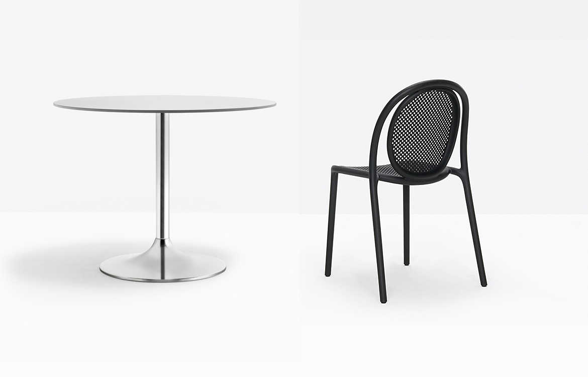 Large Trumpet table with black chair