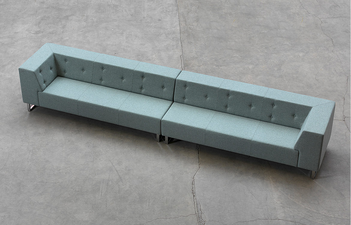 Long sofa with buttons