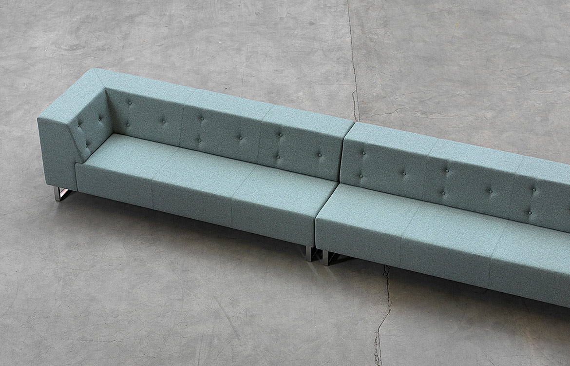 Long sofa with buttons