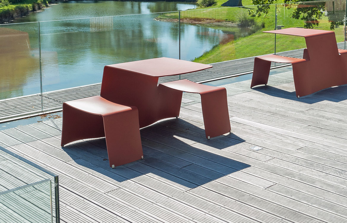 Rust red outdoor metal picnic table