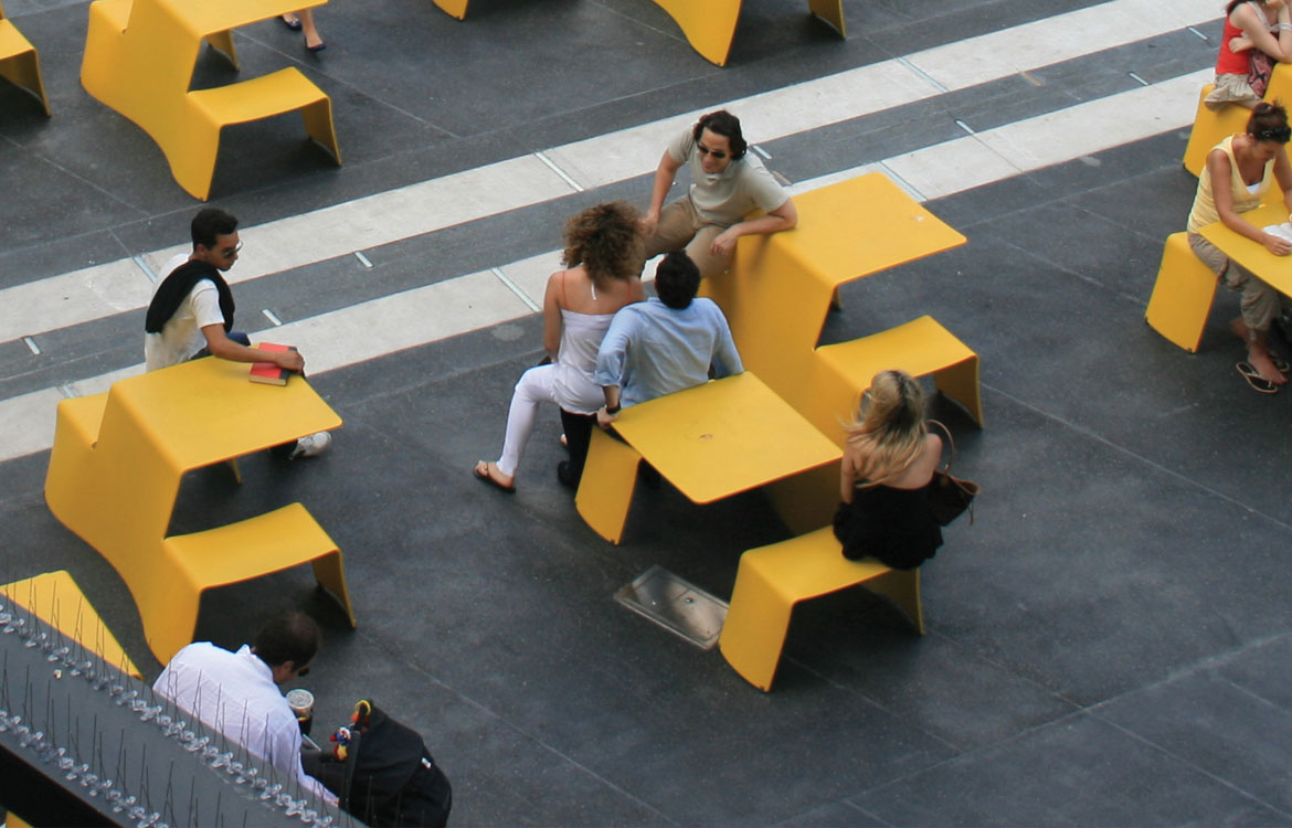 Yellow outdoor metal picnic table
