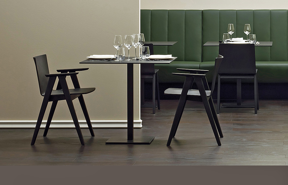 Pedrali Inox cafe table in black with black chairs