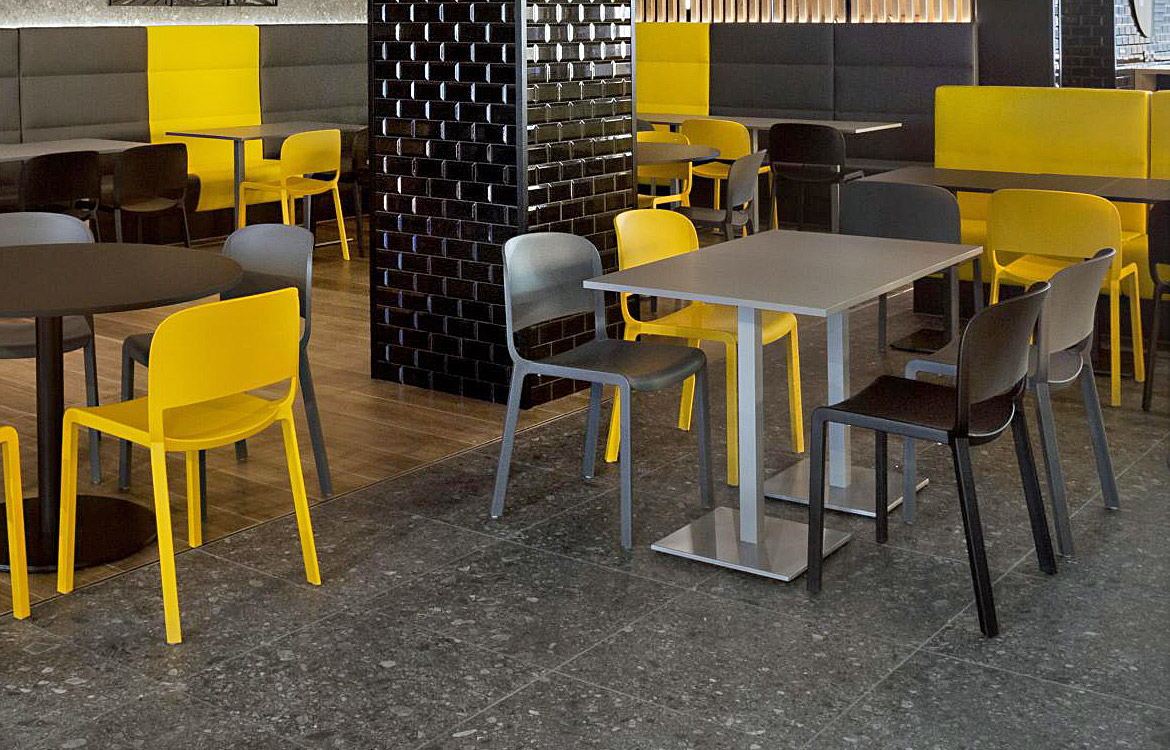 Grey cafe table and plastic chairs