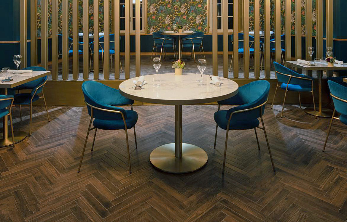 Large round brass cafe or restaurant table