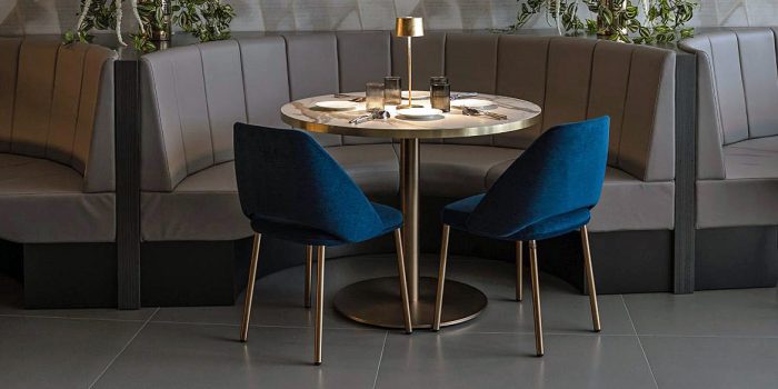 Large round brass cafe or restaurant table