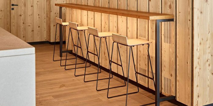 Wood stool with black legs