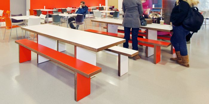 Red and white staff canteen table and benches