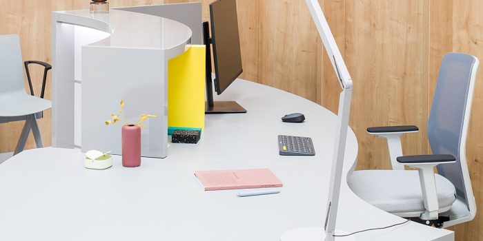 Small curved reception desk closeup