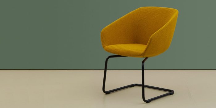 Yellow chair in retro fabric