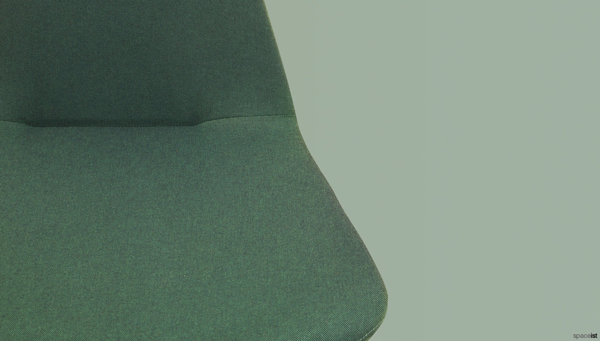 Green chair fabric closeup