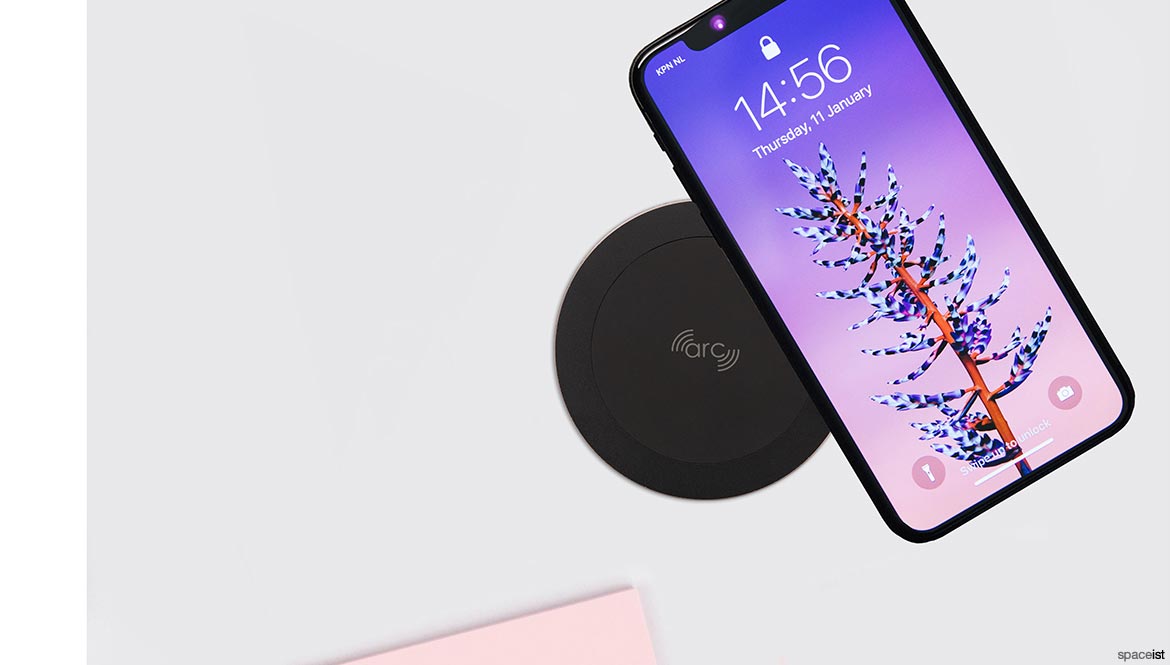 Black wireless charger with phone