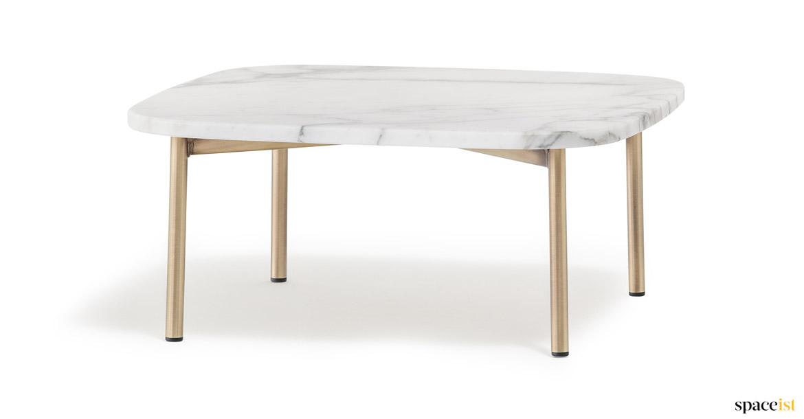 White marble table with brass legs