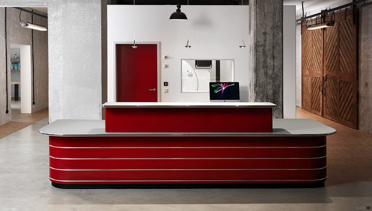 Large red reception desk