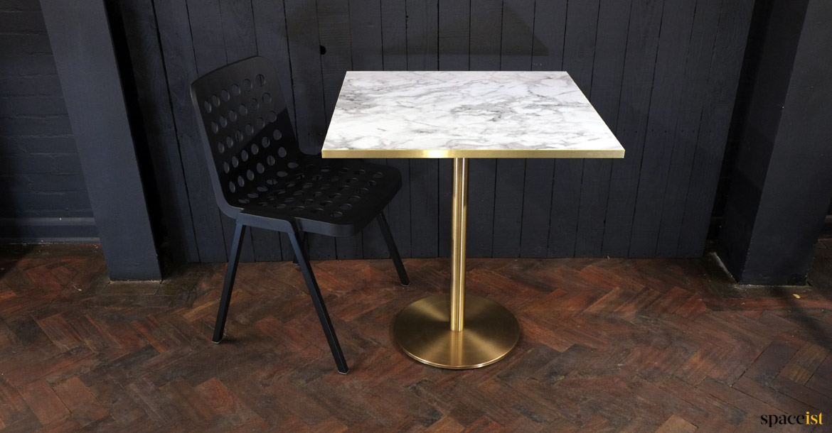 White marble table brass