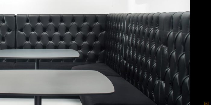 black button style banquette seating