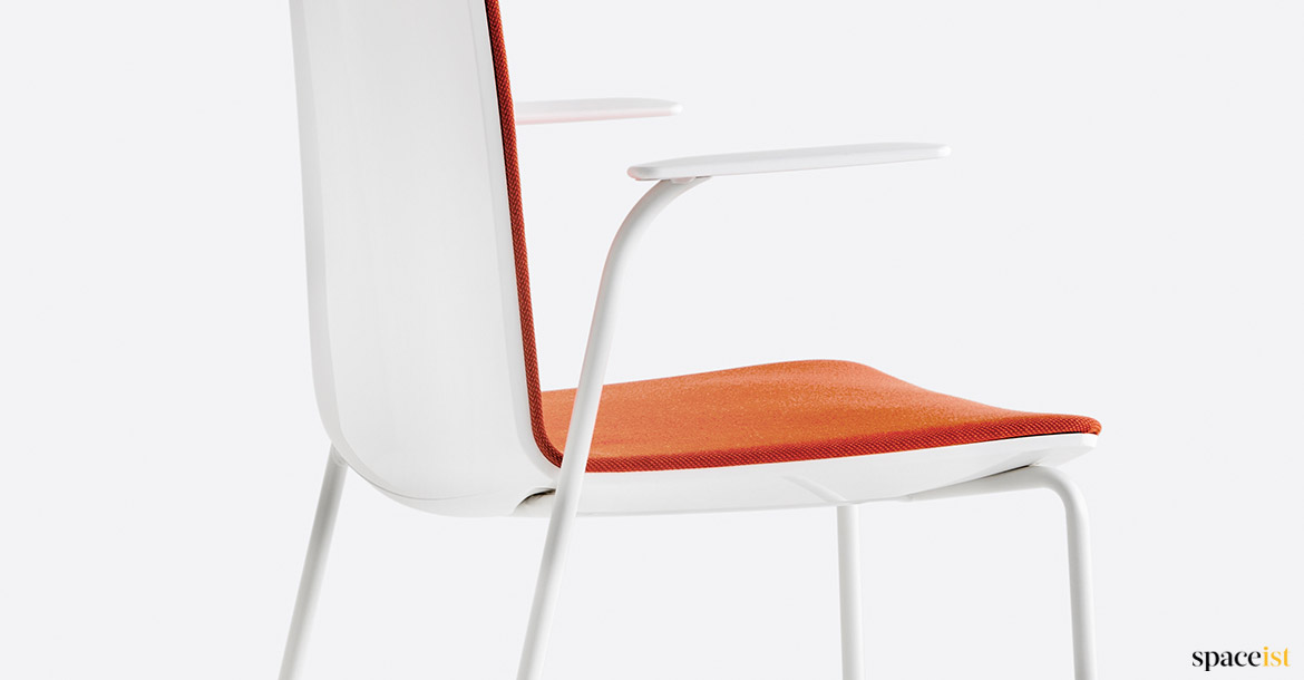 Orange chair with armrests