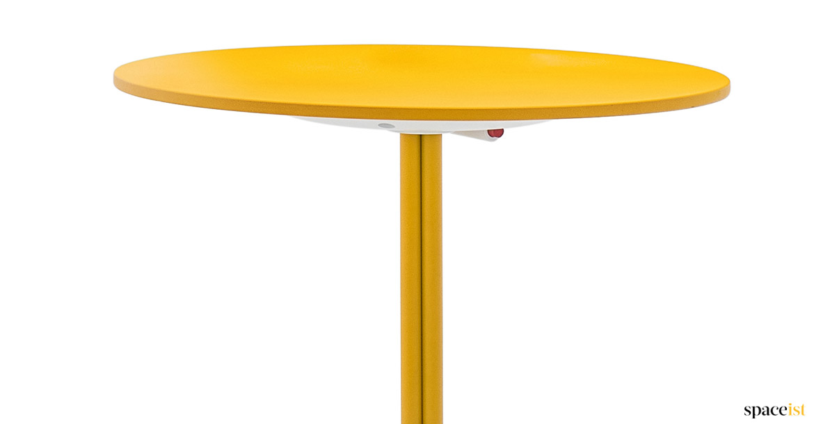Yellow round cafe table