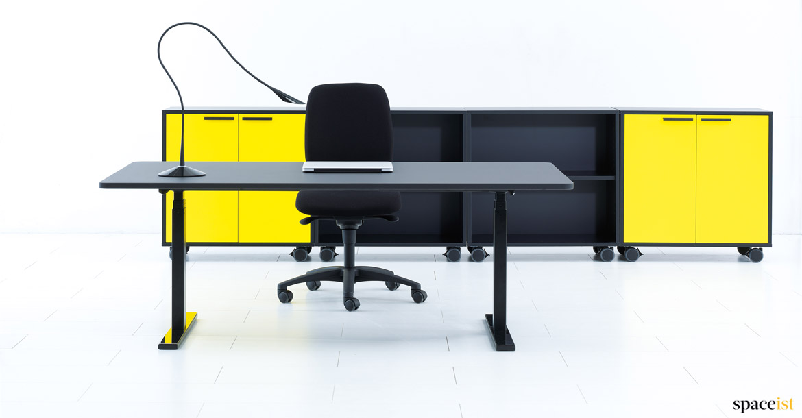 Q20 height adjustable desk with yellow storage