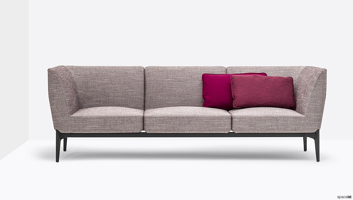 Sofa with pink cushions