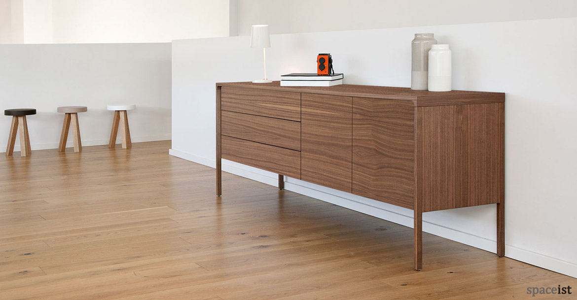 Tactile walnut meeting storage with drawers