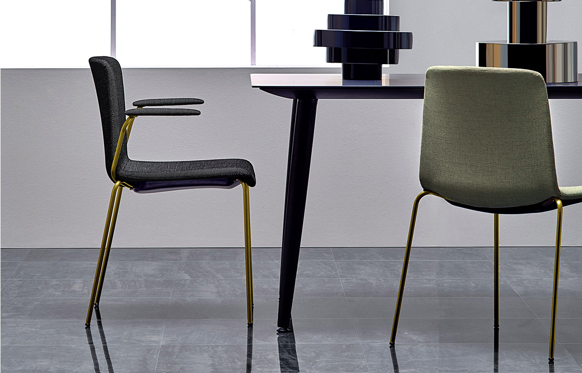 Weet meeting chair with a brass frame and dark grey seat
