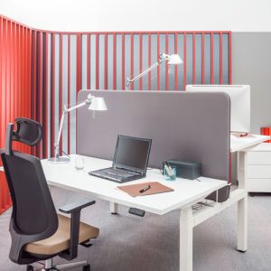 The-standing-desk-allows-you-to-work-in-a-standing-position-instead-of-sitting-down The standing desk allows you to work in a standing position instead of sitting down