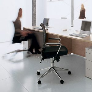 What are some key considerations when selecting furniture for a small office space?