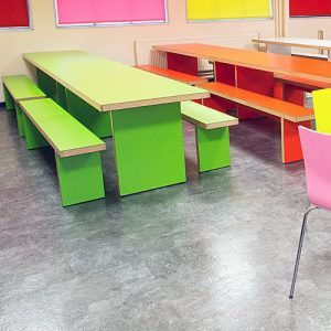 What should I consider when buying space-saving café furniture?