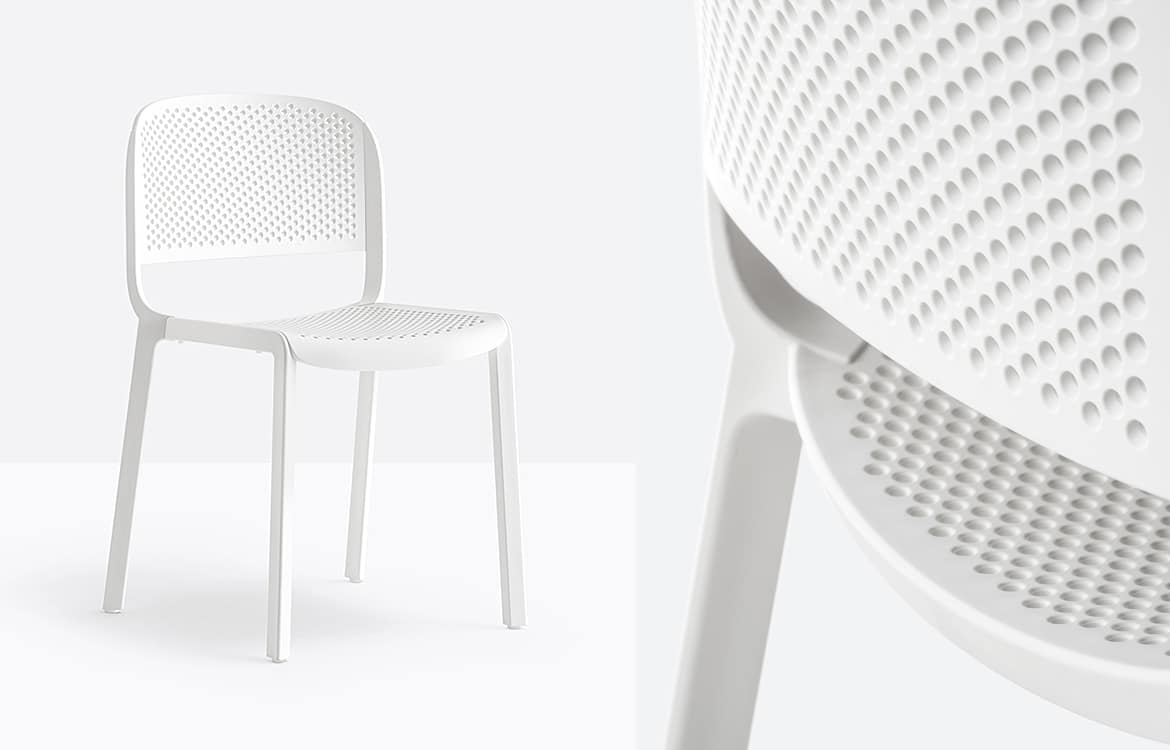 White chair with drain holes