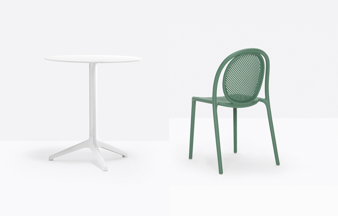 White cafe table dark green chair