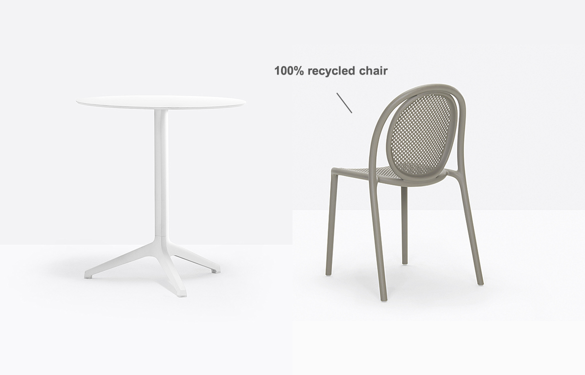 White cafe table with a recycled cafe chair