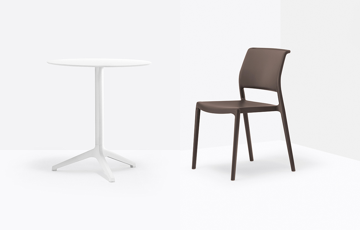 White outdoor cafe table brown chair