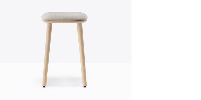 Low wood stool with seat pad