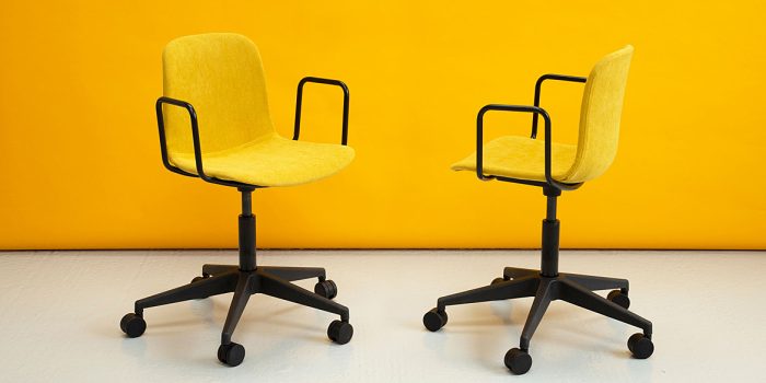 Yellow study chairs on wheels