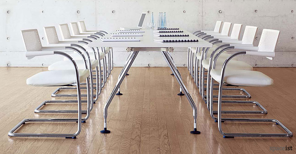 visavis cantilever white chairs