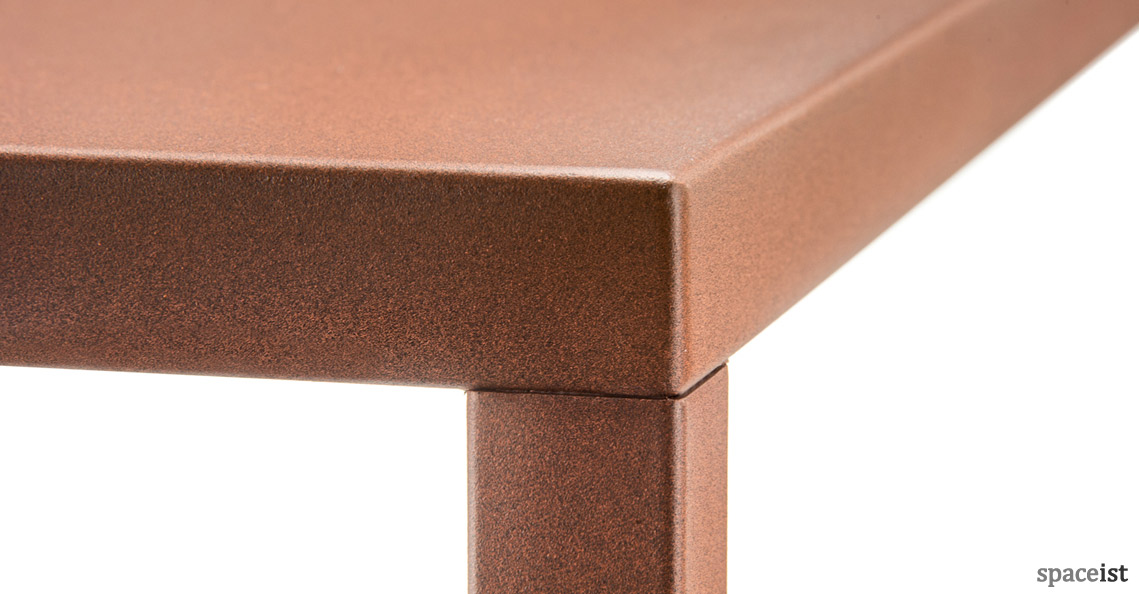 Rust colour square cafe table close up