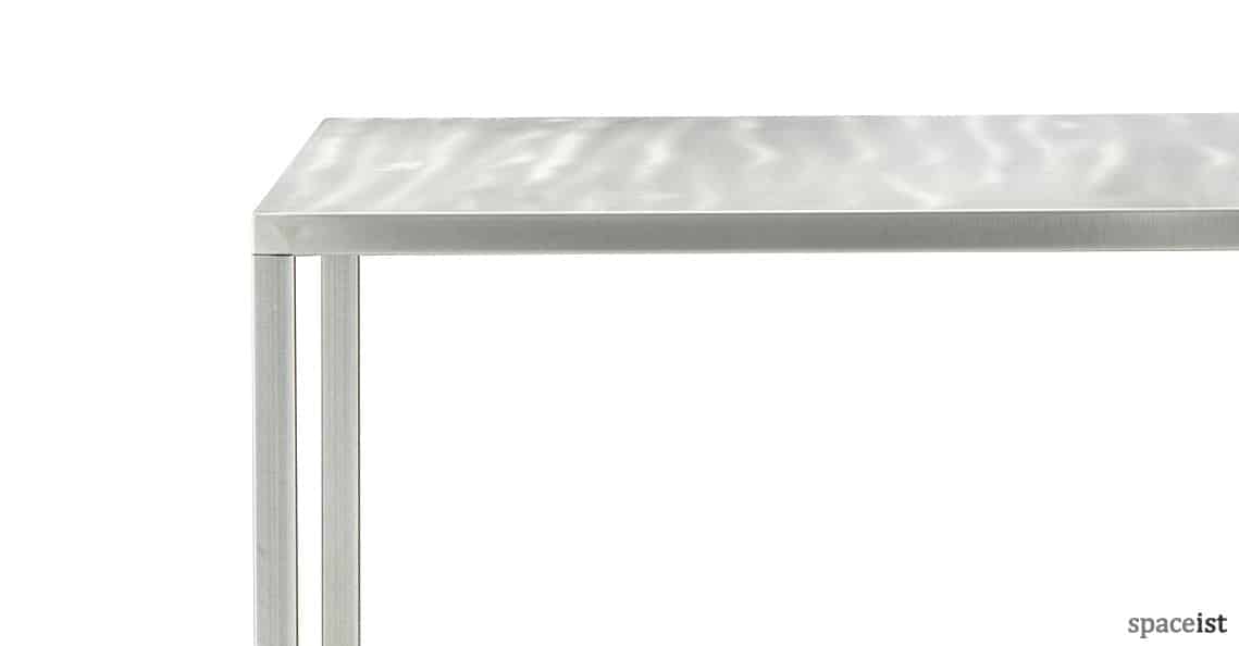 Naked metal square cafe table in clear lacquer
