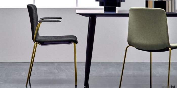 Weet meeting chair with a brass frame and dark grey seat