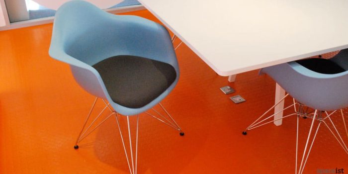 plastic blue tub meeting room chairs with a chrome base