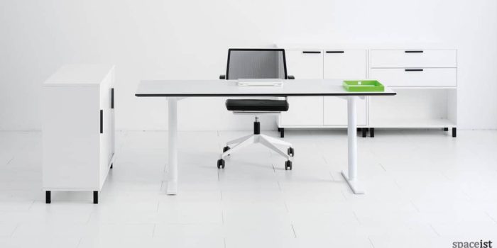 Q-10 standing office desk with a white leg and top
