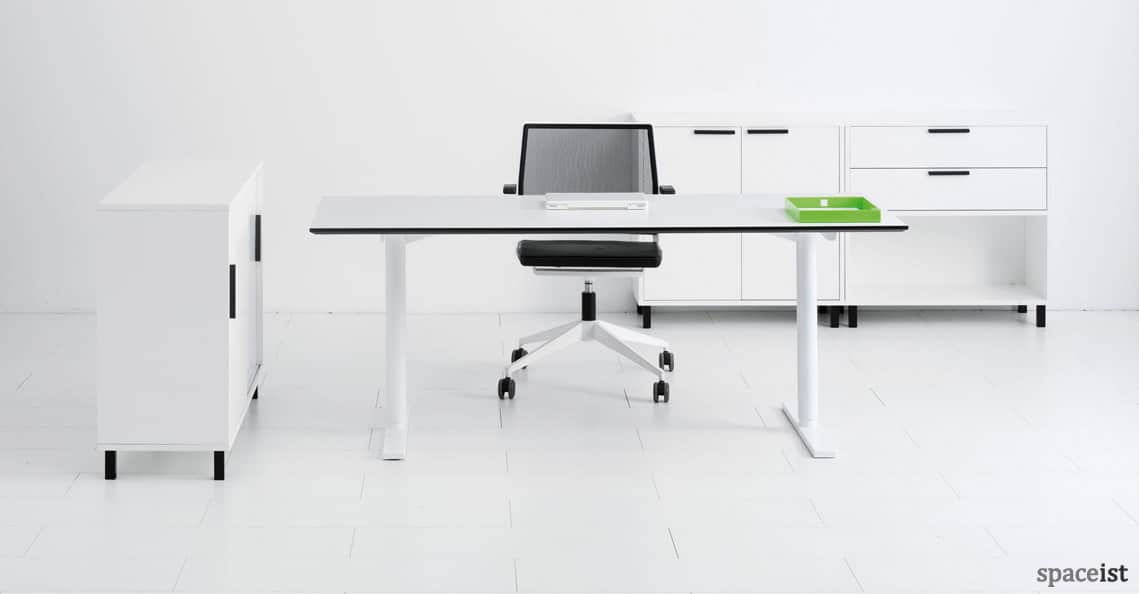 Q-10 standing office desk with a white leg and top